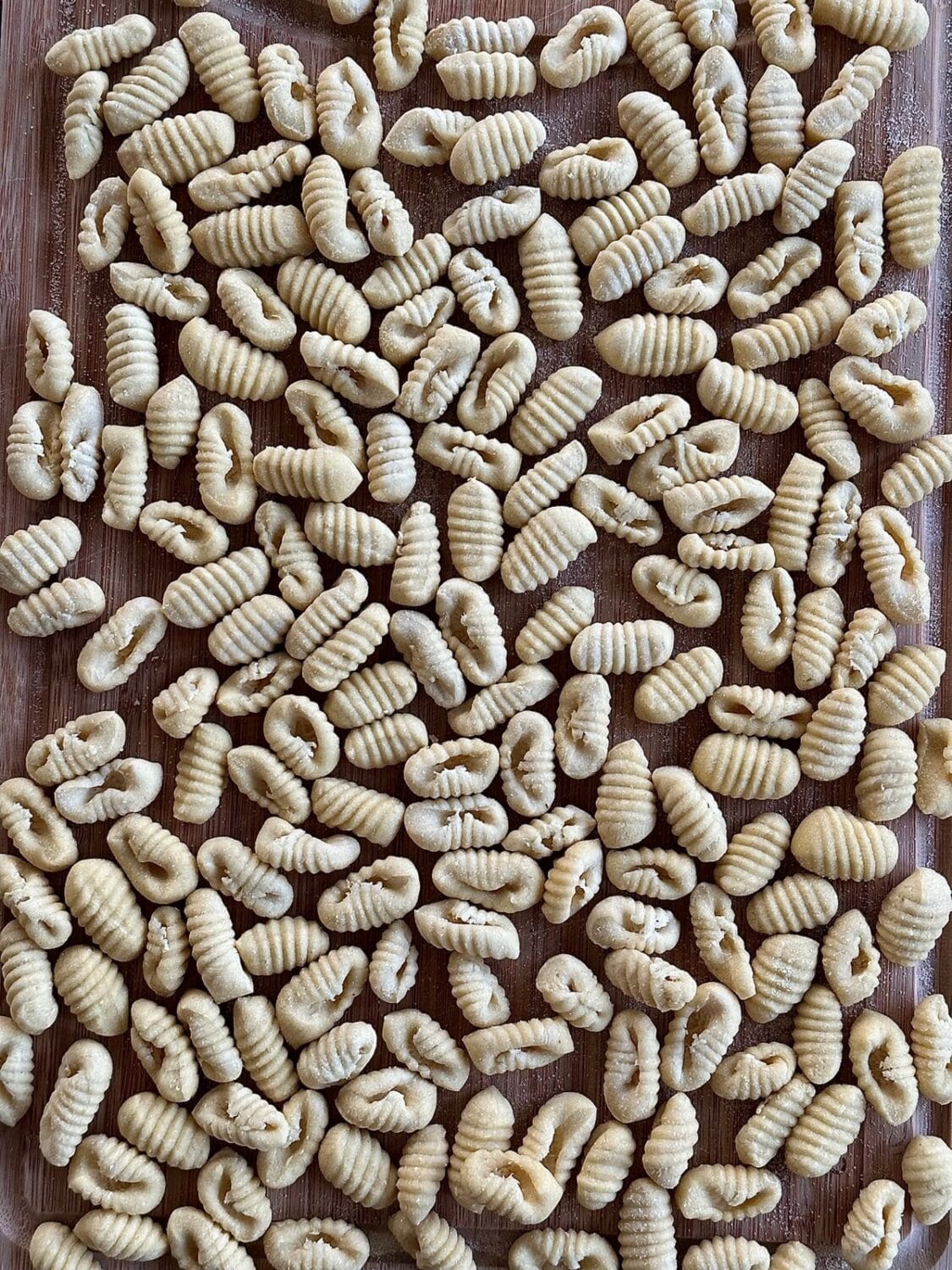 Homemade gnocchi sardi pasta on wooden board