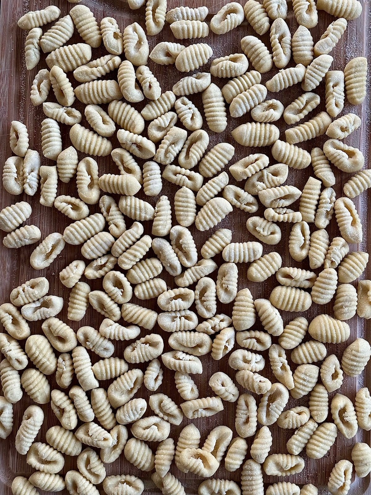Homemade gnocchi sardi pasta on wooden board